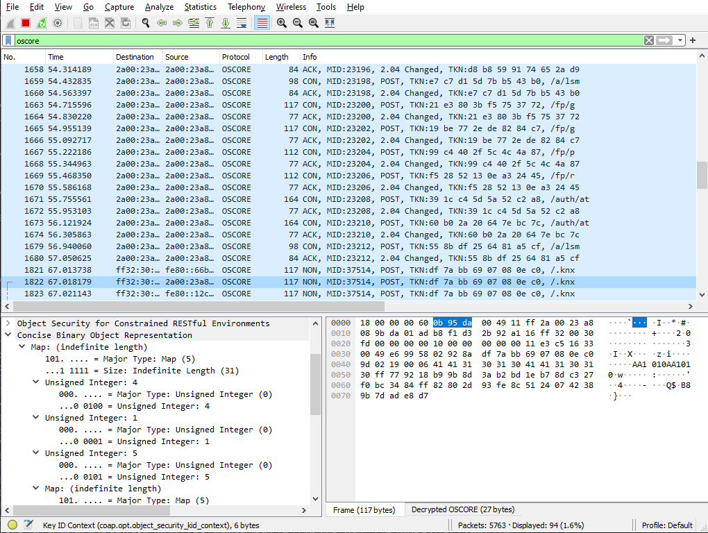 Screenshot of Wireshark showing packets captured by the Cascoda Sniffer. OSCORE is successfully decrypted, and the packets show the configuration process from within ETS.